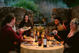 Group of people having an outdoor dinner 