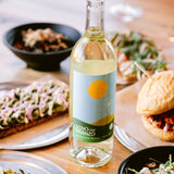 Vino del Pranzo wine bottle surrounded by food