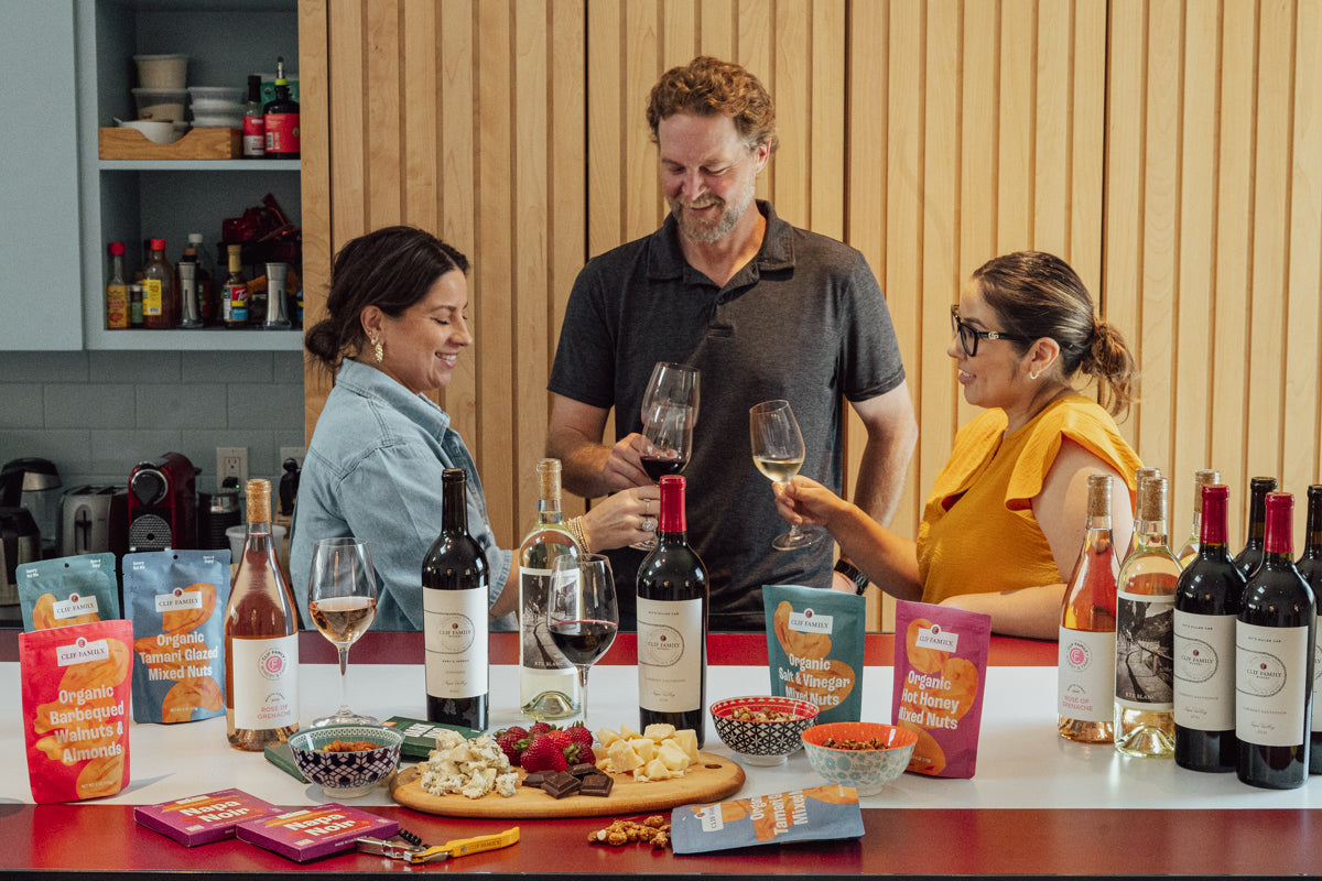 Team toasting over Clif Family wine and farm-made snacks in the office